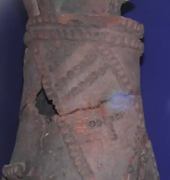 Circles forming a cross on a clay